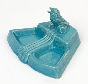 A blue glazed Australian pottery desk tray with kookaburra decoration, 9cm high, 17cm wide