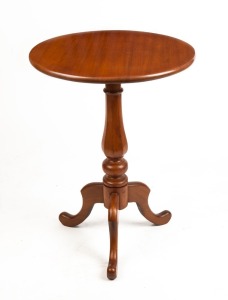 An Australian cedar wine table with octagonal baluster form column, circa 1865, 73cm high, 53cm diameter