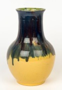 P.P.P. (PREMIER POTTERY PRESTON) baluster shaped pottery vase, yellow ground with blue, pink and green glaze, stamped "P.P.P.", 21.5cm high - 2