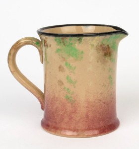 P.P.P. (PREMIER POTTERY PRESTON) jug with sponge work decoration glazed in pink, green and brown with yellow highlights, stamped "P.P.P.", 12.5cm high, 15cm wide