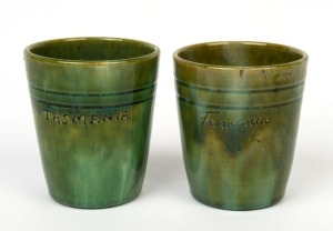 JOHN CAMPBELL pair of green glazed "TASMANIA" pottery beakers, incised "John Campbell", ​​​​​​​9.5cm high