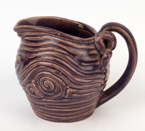 BROADBENT POTTERY unusual coil pot jug with purple glaze, incised "D. Broadbent", 13cm high