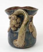 MERRIC BOYD pottery jug with applied grapes, leaves and branch handle, incised "Merric Boyd (M), 1929", 16cm high, 18cm high - 4