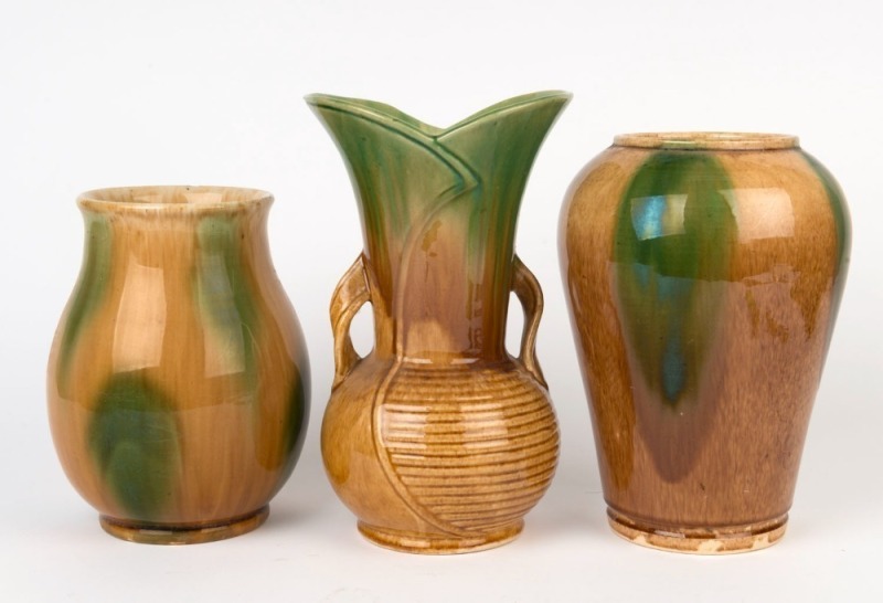 BENDIGO POTTERY, three green and brown glazed mantel vases, 27cm, 25cm and 21cm high