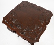 An Australian dark stained pine chip carved occasional table with shaped top, early 20th century, 79cm high, 61cm wide, 61cm deep - 2