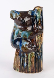 HUNTLY POTTERY koala tree stump vase with mottled glazed, stamped "Huntly Pottery", 22cm high