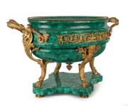 A superb antique French wine cooler, carved malachite with ornate ormolu mounts, adorned with face masks and hoof supports, original tin liner and attractive scrolling pierced and fretted foliate mounts to sides. Most likely made for the Russian market, m - 4