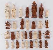 A Chinese ivory chess set (32 pieces), early to mid 20th century, ​the tallest 15.5cm - 2