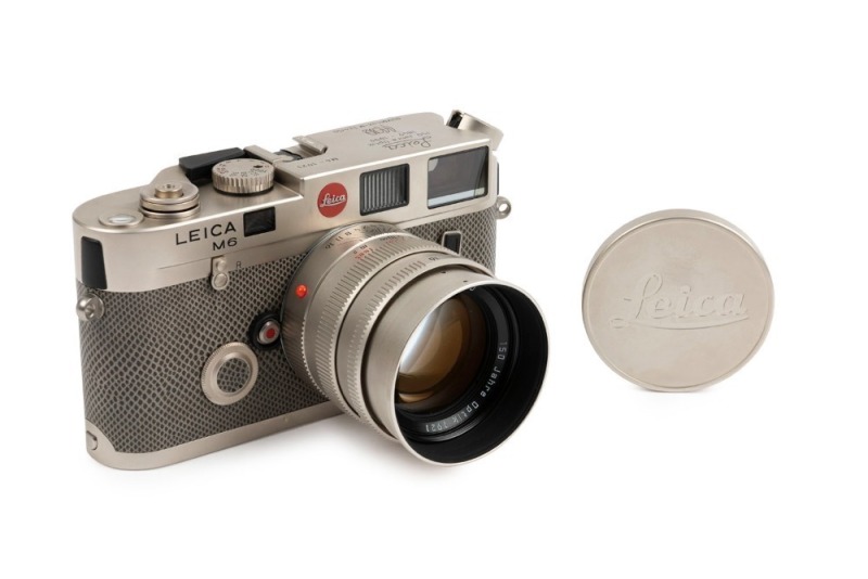 LEITZ: Leica M6 Commemorative "150 Jahre Optik" Platinum [#M6-1921], 1999, Summilux-M f1.4 50mm "150 Jahre Optik 1921" lens and cap. Only 150 units were produced to commemorate 150 years of the Wetzlar Optisches Institut. Original box, paperwork and caps