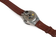 STEINECK KAMERAWERK (Germany): Steineck A-B-C wristwatch camera, c1949, for 8 exposures on circular film in a special magazine; with Steineck CL 12.5mm f2.5 lens and original brown leather wristband - 2