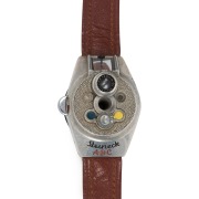 STEINECK KAMERAWERK (Germany): Steineck A-B-C wristwatch camera, c1949, for 8 exposures on circular film in a special magazine; with Steineck CL 12.5mm f2.5 lens and original brown leather wristband - 3