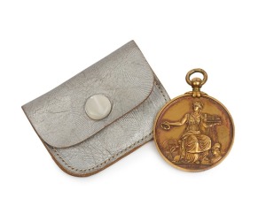 An Ilford medal for first prize awarded to W. J. White Esq. in 1895 in original Bravingtons of Kings Cross, London leather pouch.