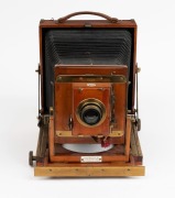 Thornton-Pickard: New Imperial Triple Extension half plate field camera, mahogany with brass trim and strips above and below rollerblind shutter, with leather bellows, circa 1910, with Aldis Anastigmat f7.7 No. 7 lens. - 3