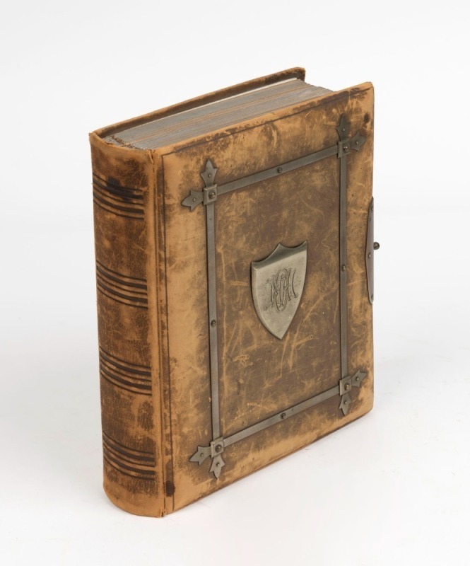 A leather bound cabinet card photo album with silver trimmings containing 29 portraits, predominantly English Archbishops, Deans, Bishops and other public figures including Lord Shaftsbury, Benjamin Disraeli, Charles Kingsley and others, circa 1880s-1890s