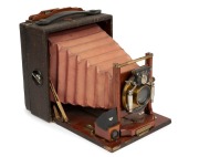 Rochester Optical Company: Pony premo No. 3 folding bed camera, circa 1905, with Bausch & Lomb "Victor" shutter and rectilinear lens. Original leather bellows. Double dark slide present.