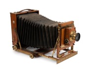 Thornton-Pickard: Imperial Perfecta double extension half plate camera, circa 1909, with Beck symmetrical lens and Thornton-Pickard rollerblind shutter; Ketts, Melbourne retailer's plaque