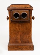 The Stereoscopic & Photographic Company (Regent Street, London): Revolving stereoscope table top stereo viewer in lovely walnut case with many cards present, circa 1895; 44cm high. - 3