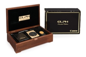 CANON: Elph IXUS 18k gold-plated Limited Edition complete kit (with documentation) [#002221] in velvet-lined timber case. Issued in 1997 to commemorate the 60th anniversary of the Canon Company.