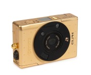 CANON: Elph IXUS 18k gold-plated Limited Edition complete kit (with documentation) [#002221] in velvet-lined timber case. Issued in 1997 to commemorate the 60th anniversary of the Canon Company. - 2