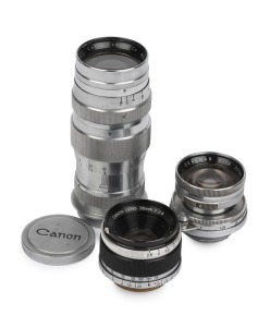 CANON screw-mount lenses: Canon 35mm f2.8 [#32489]; Serenar 50mm f1.9 [31793]; and, Serenar 135mm f4. (3 items).
