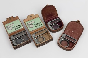 CANON ACCESSORIES: Canon Auto-Up V-1; Canon Auto-Up V-11; Canon Auto-Up 1 and Canon Auto-up 11; all in maker's embossed leather cases. (4).