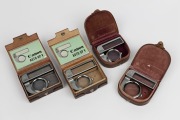 CANON ACCESSORIES: Canon Auto-Up V-1; Canon Auto-Up V-11; Canon Auto-Up 1 and Canon Auto-up 11; all in maker's embossed leather cases. (4).&nbsp;