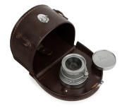 LEITZ: Elmar 50mm f3.5 (BM, chrome) lens [#1333915] ELMAR [111], with metal cap in Leica leather case.&nbsp;