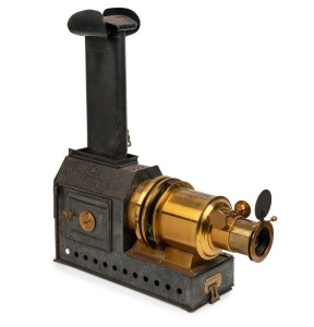 MAGIC LANTERN: The 'Praestantia' by Riley Brothers of Bradford. Engraved to the barrel of the lens with the words "The Praestantia, Riley Bros Ltd, Bradford" and also bearing a similarly marked embossed brass makers plate to the base of the four-burner unit. Approx 53cm with lens extended and 59cm high to top of chimney when fully extended.