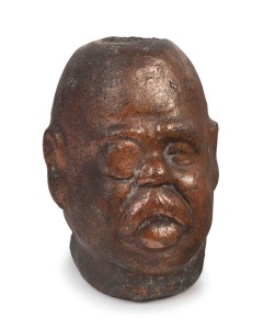 GEORGE REID novelty pottery head bottle, circa 1904. Unknown maker, possibly a workman's piece from one of the brickworks. Reid was a very popular target for caricaturists due to his portly and rotund profile. This piece is only the second example known to our rooms. Rare. 11cm high