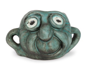 HENRY BOLTE pottery face mug by GUS & BETTY McLAREN of Warrandyte, Victoria, circa 1970s. Modeled after a work by the noted political cartoonist LES TANNER. Incised "Designed By Tanner", ​​​​​​​11cm high, 17cm wide