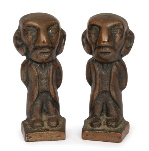 BILLY HUGHES pair of antique cast metal door stops, early 20th century, 15cm high