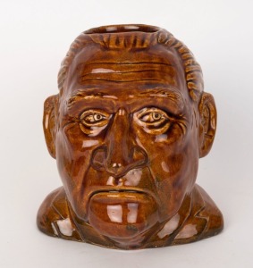 JOHN McEWAN pottery charcter jug by EWAN McDonald, circa 1967. McEwan was Prime Minister for only 22 days being appointed after the disappearance of Harold Holt. Incised "Ewan McDonlald", 15cm high
