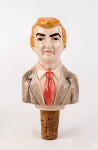 BOB HAWKE ceramic bottle stopper, circa 1980. A people's favourite, Bob Hawke gained much popular support and admiration for his famous world record beer drinking feats. 9.5cm high, 13cm high including the cork