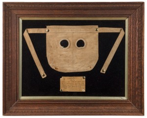 SOLITARY CONFINEMENT PRISONER'S MASK from the Maitland Prison in New South Wales, framed and mounted with paperwork attached verso, 19th century, frame 46 x 56cm overall