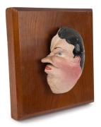 ARTIST UNKNOWN sailor's folk art wall mounted profile caricature plaque, hand-painted whale's eardrum, 19th century, ​​​​​​​13cm high, the wooden mount 20 x 19cm overall - 2