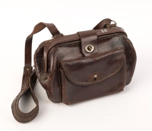 ADELAIDE MTT TRAM CONDUCTORS BAG: circa 1950's, Municipal Tramways Trust leather bag with original strap and inserted metal cash tray. 20cm high, 30cm wide 