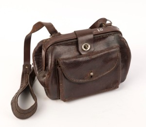 ADELAIDE MTT TRAM CONDUCTORS BAG: circa 1950's, Municipal Tramways Trust leather bag with original strap and inserted metal cash tray. 20cm high, 30cm wide