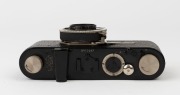 LEITZ: Leica I, Model B Compur Rim Set Shutter camera, 1929, [#13297 series] making it the 143 camera in the series. The total production was 1072 units. The camera has a round base accessory shoe; Elmar f3.5 50mm lens, Shutter #2008474. - 5