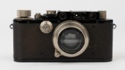 LEITZ: Leica Model IIIa conversion of a Model I body [#312], 1934, with Summar f2 50mm lens [#209650]; black version with German engraving to base - 2