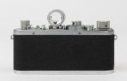 LEITZ: Leica Model Ic [#455931], 1949, "Shark skin" leatherette body casing, fitted with OEINO rangefinder and with Elmar f3.5 50mm Lens [#711854] and bakelite front lens cap. - 3