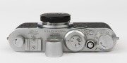 LEITZ: Leica Model Ic [#455931], 1949, "Shark skin" leatherette body casing, fitted with OEINO rangefinder and with Elmar f3.5 50mm Lens [#711854] and bakelite front lens cap. - 4