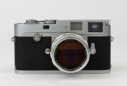 LEITZ: Leica Model M2 Chrome button Rewind D/A [#949745], 1959, with Summilux f1.4 50mm lens [#1660945] - 2