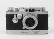 LEITZ: Leica Model IIIg Chrome [#933163], 1958, with Elmar f2.8 50mm lens [#1550708]. Camera body fitted with a SYOOM C5135 Leicavit Winder. - 2