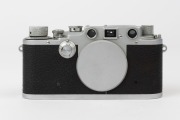 LEITZ: Leica Model IIIc Luftwaffe Eigentum [#381458] with Fl. No. 38079 on top plate, Luftwaffe insignia on rear of top plate has been removed. Aluminium body cap present. - 2