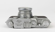 LEITZ: Leica Model IIIa Chrome D.R.P. 2nd Line [#332619], 1939, with Summitar f2 50mm lens [#489900], a Leitz yellow filter and a Leica metal cap. Camera base fitted with SCNOO Rapid Winder. - 2