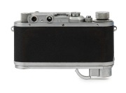 LEITZ: Leica Model IIIa Chrome D.R.P. 2nd Line [#332619], 1939, with Summitar f2 50mm lens [#489900], a Leitz yellow filter and a Leica metal cap. Camera base fitted with SCNOO Rapid Winder. - 4