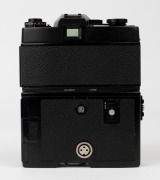 LEITZ: Leica Model Leicaflex SL Mot Black [#1372621], 1974, with Summilux-R f4 50mm lens [#2493110]. Leicaflex Motor Drive attached to base. - 3