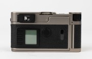LEITZ: Leica Model CM 35mm point-and-shoot camera, 2004, [#2952002] with fixed Summarit f2.4 40mm lens and Leica brown leather carry case with strap. - 3