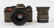LEITZ Portugal: Leica R3 Electronic Safari [#1469842], 1978, fitted with Summilux-R f4 50mm lens [#2806895]. Together with a Leitz 12508 lens hood and an additional Elmarit-R f2.8 28mm lens [#2876165] with rear cap and hood. Original Leitz certificate for - 2
