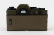 LEITZ Portugal: Leica R3 Electronic Safari [#1469842], 1978, fitted with Summilux-R f4 50mm lens [#2806895]. Together with a Leitz 12508 lens hood and an additional Elmarit-R f2.8 28mm lens [#2876165] with rear cap and hood. Original Leitz certificate for - 3